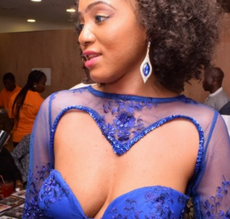 See this lady Publicly displaying her chest.
